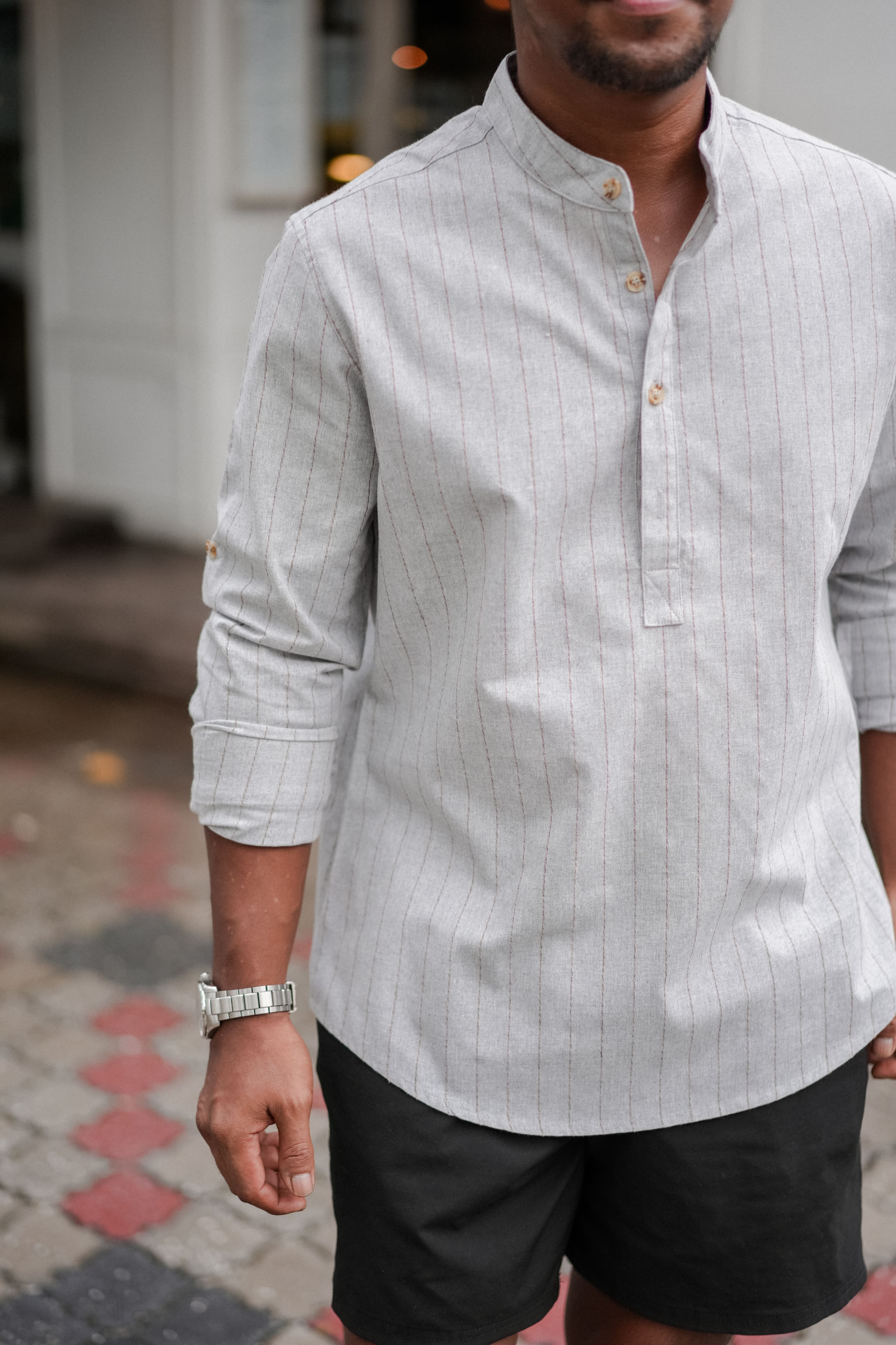 male model in black short and grey kurta by Petit Moi