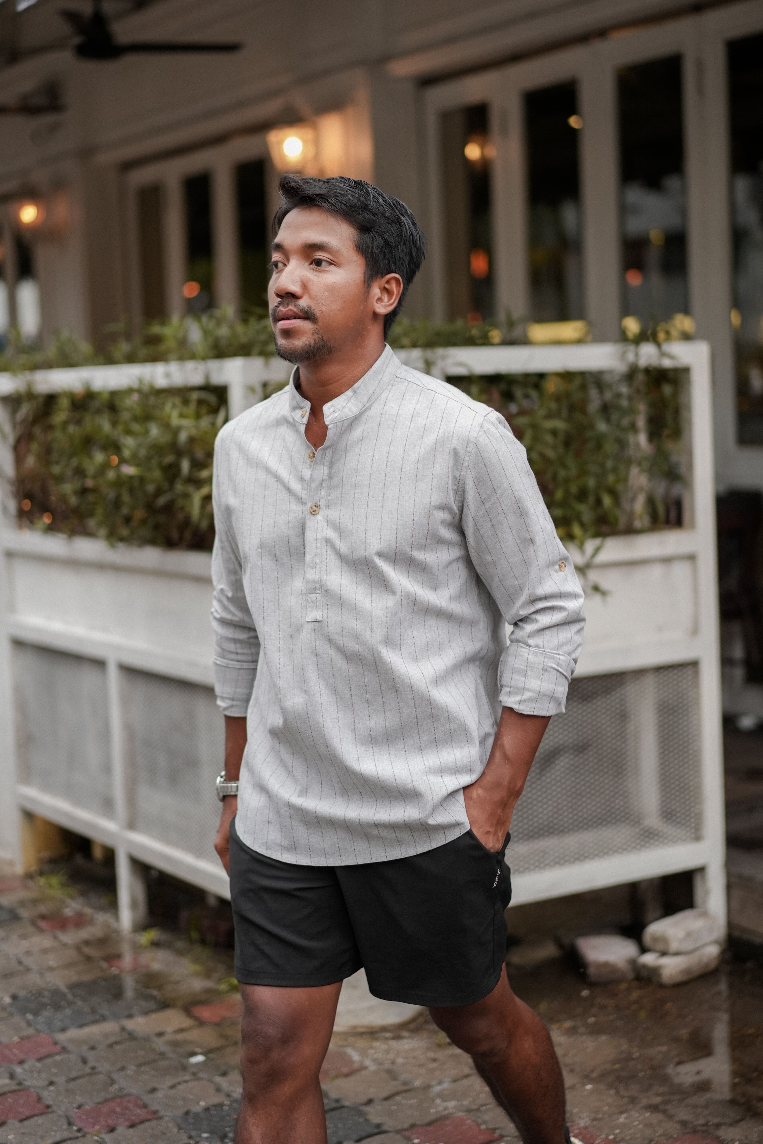 male model in black short and grey kurta by Petit Moi