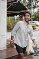male model in black short and grey kurta by Petit Moi