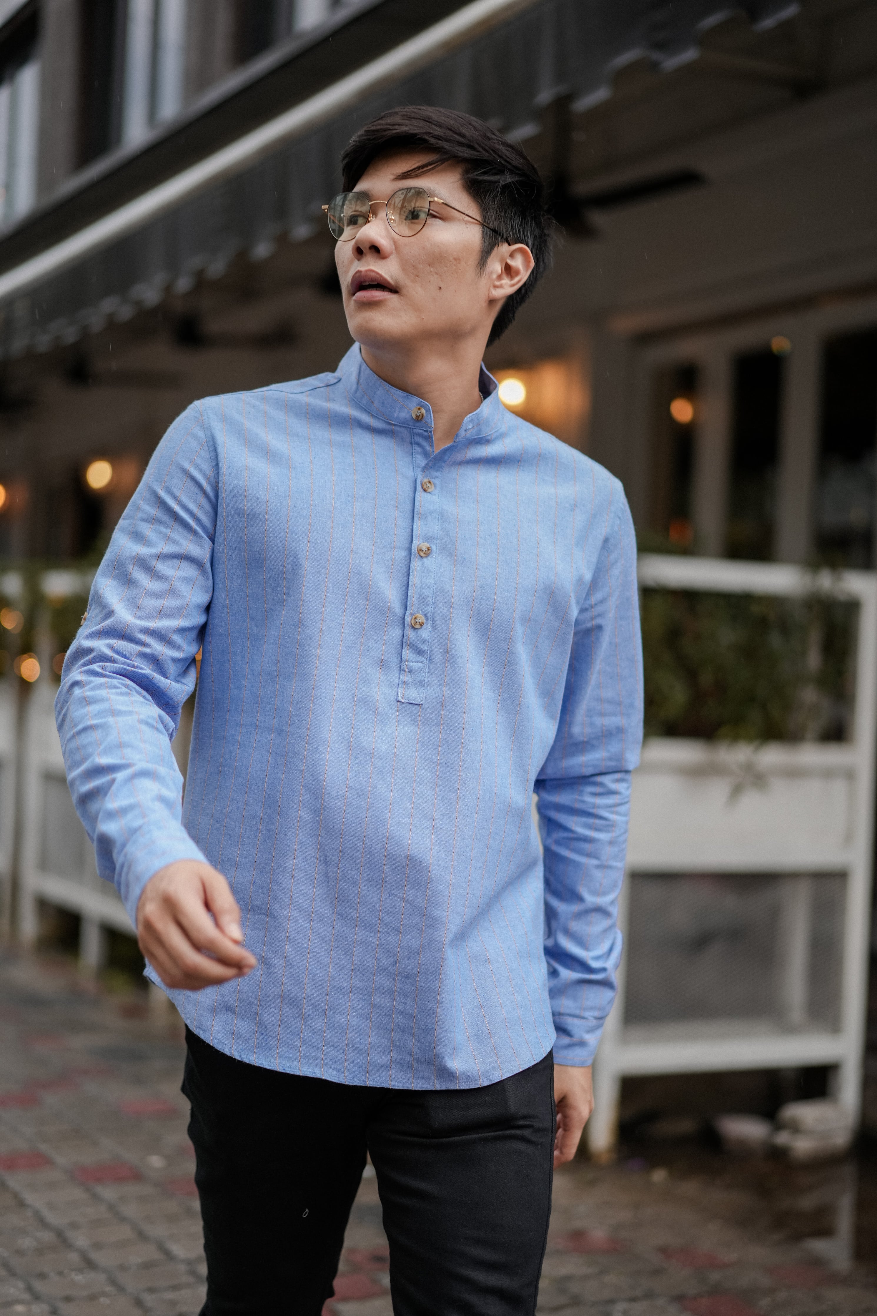 asian man in blue kurta by Petit Moi