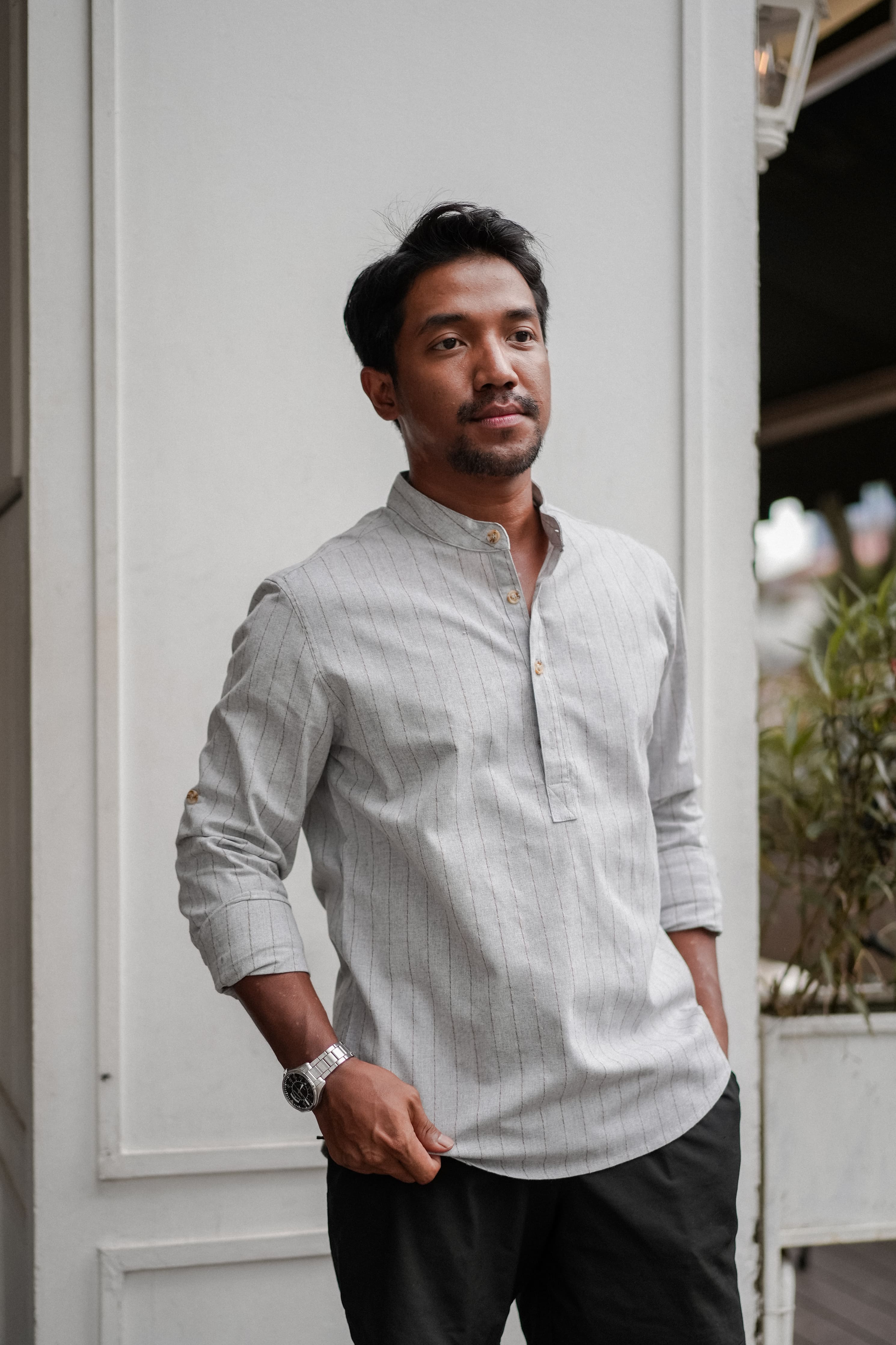 male model in black short and grey kurta by Petit Moi