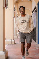male model smiling in petit moi jumper