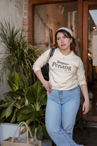 female model posing in jumper by petit moi