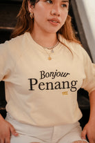 female model posing in petit moi jumper