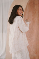 woman in high quality white baju kurung