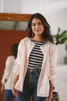woman in high quality white baju kurung with casual look