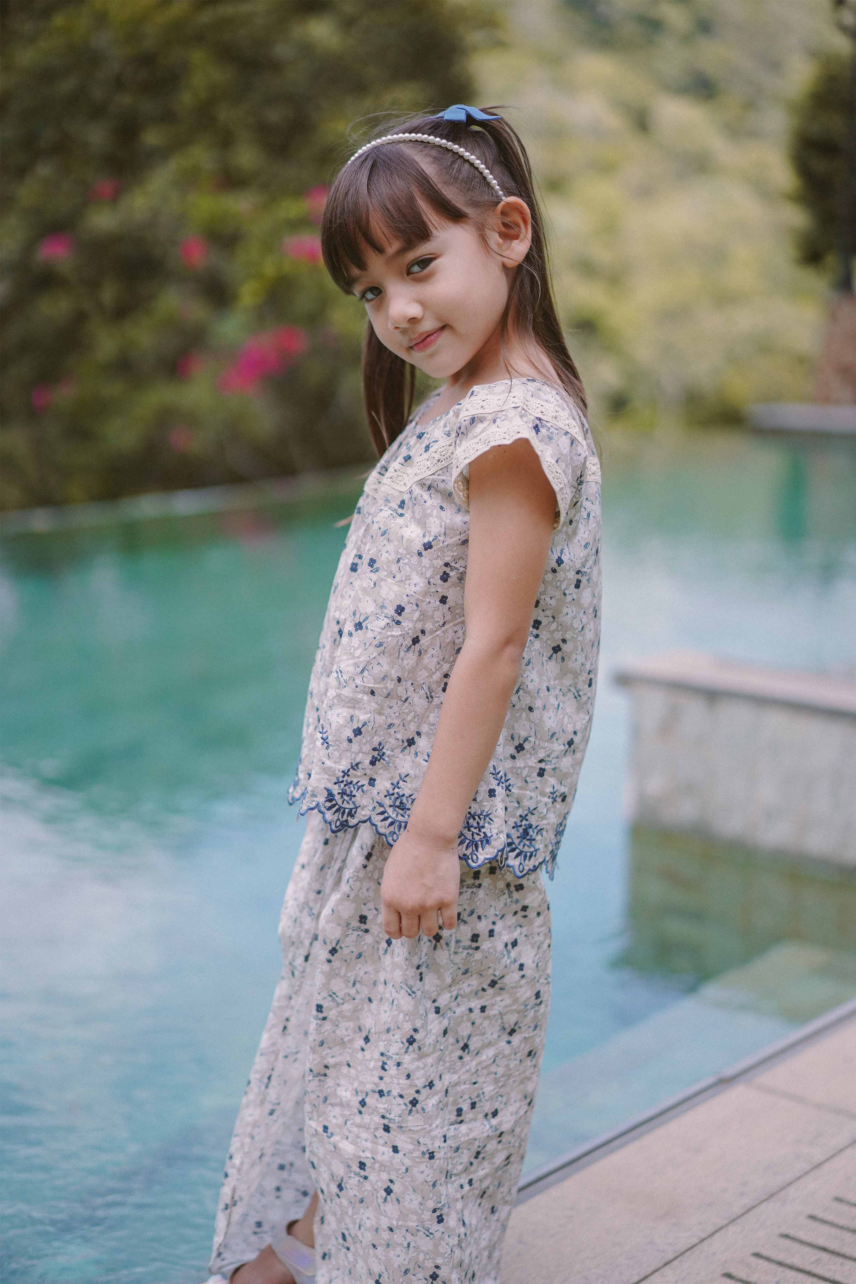 girl in modern high quality baju kurung by Petit Moi