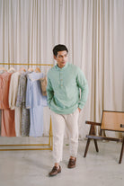 male model in green kurta by Petit Moi