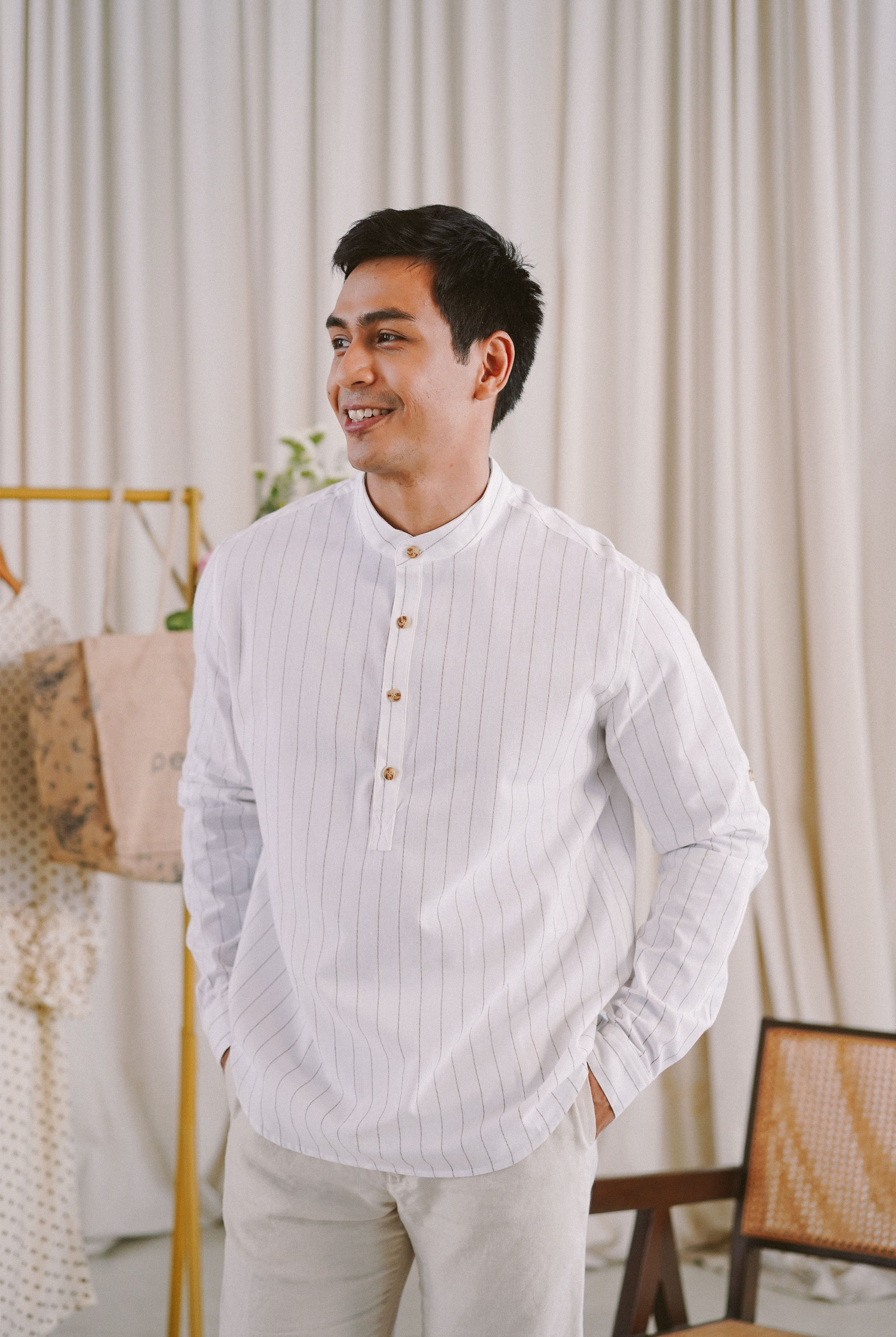 male model in white striped kurta by Petit Moi