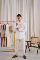 male model in white striped kurta by Petit Moi