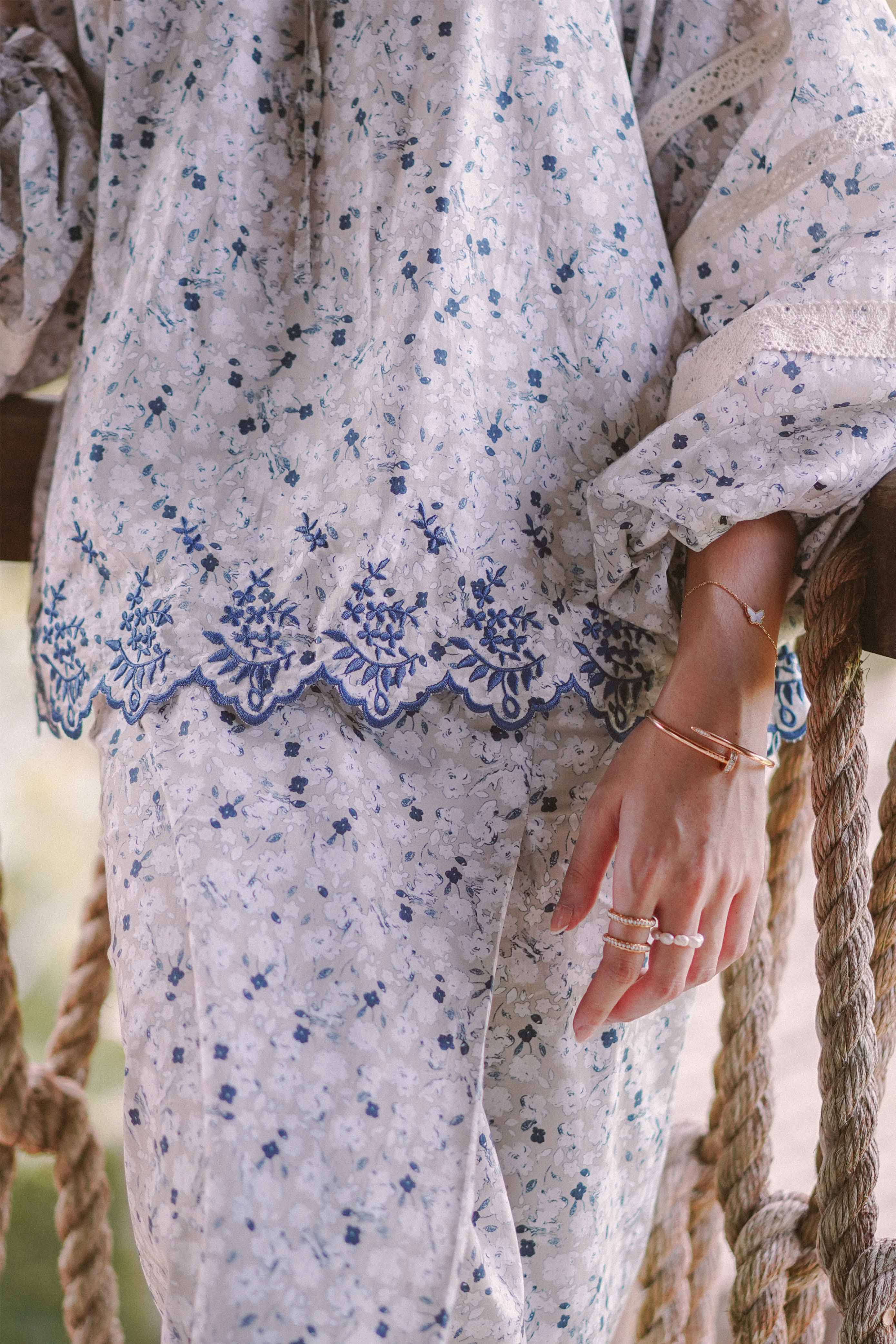 Closeup shot of floral baju kurung made by petit moi