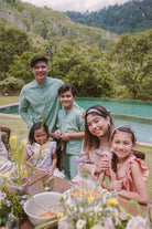 friends & family wearing high quality modern Malaysian clothing by Petit moi