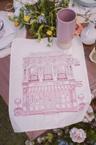 Petit Moi Bingka Tea towel and a cup