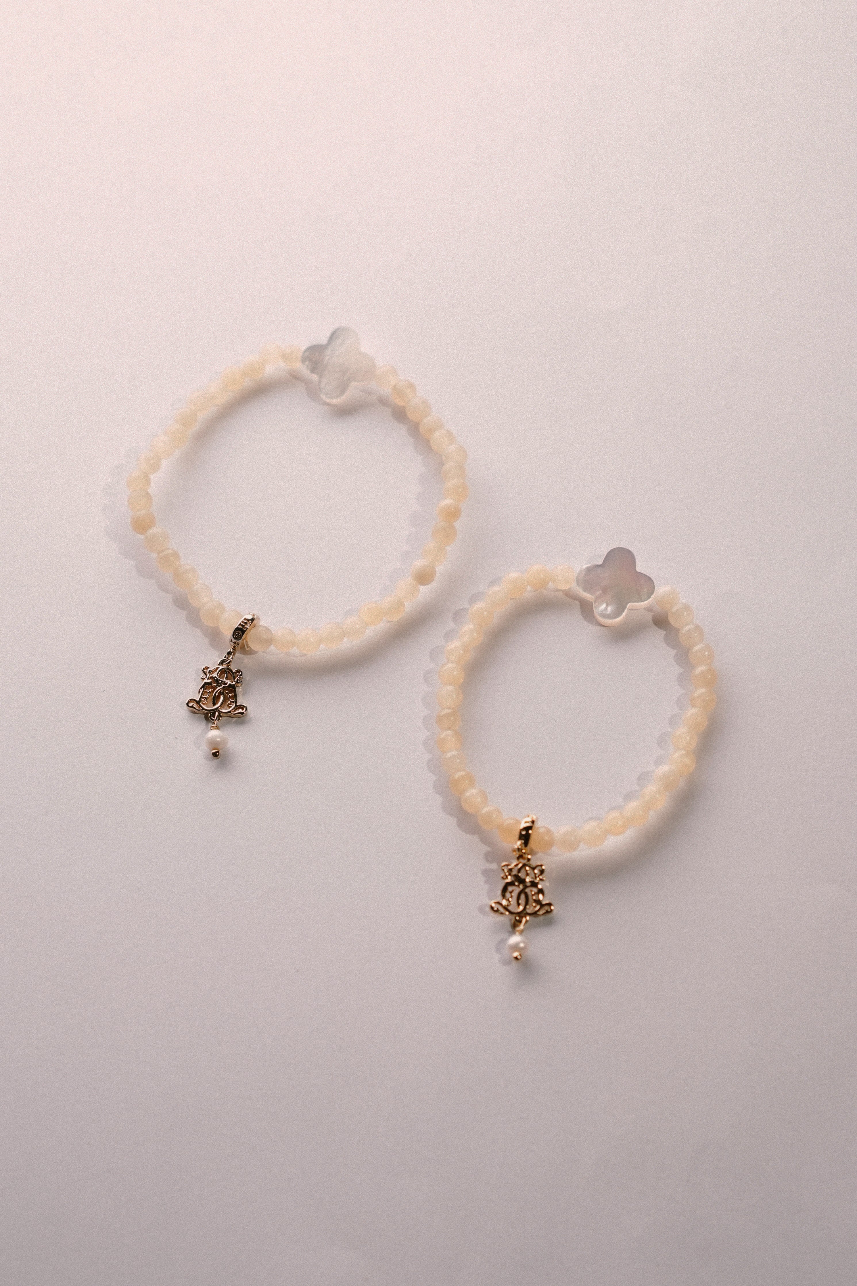 two bracelets placed on white background for photoshoot