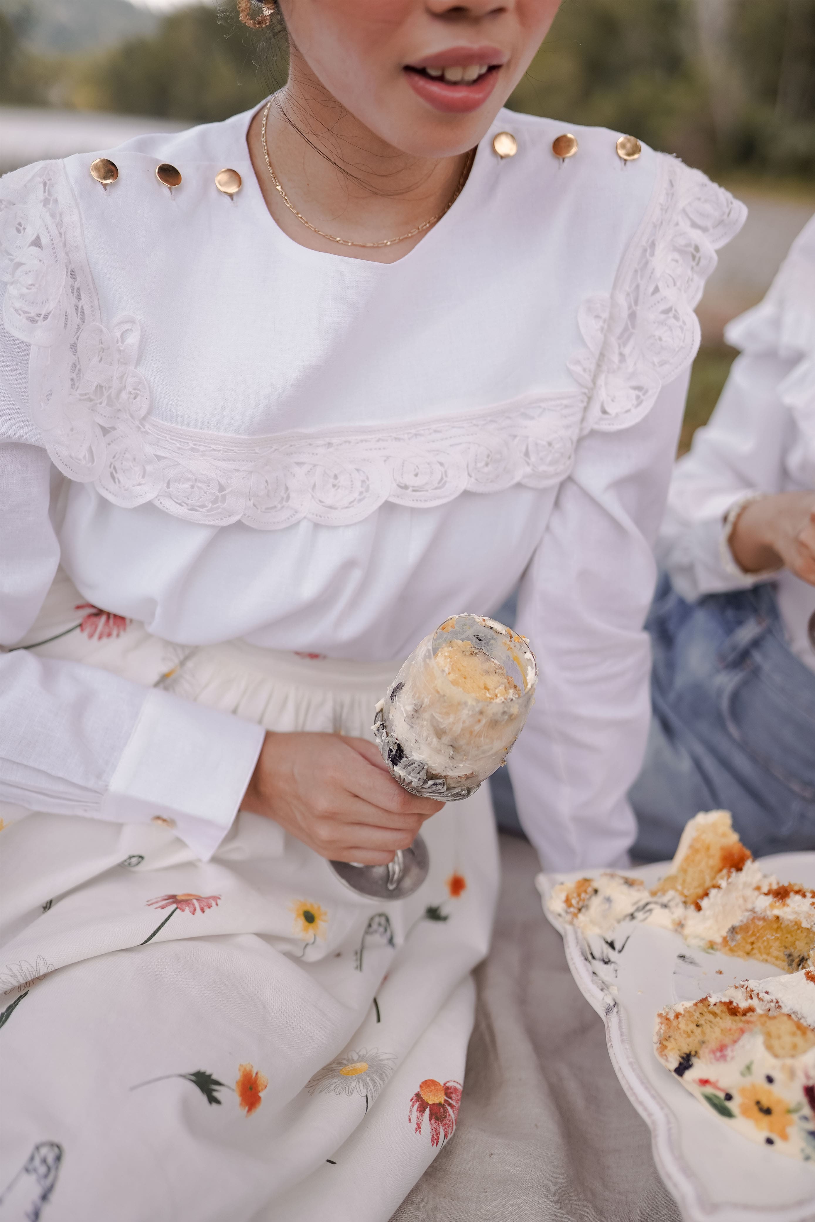 Lady having a picnic in white top from Petit Moi