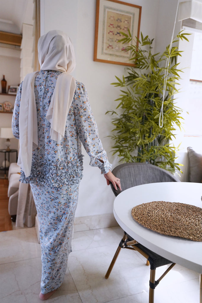female model in high quality baju kurung by Petit Moi