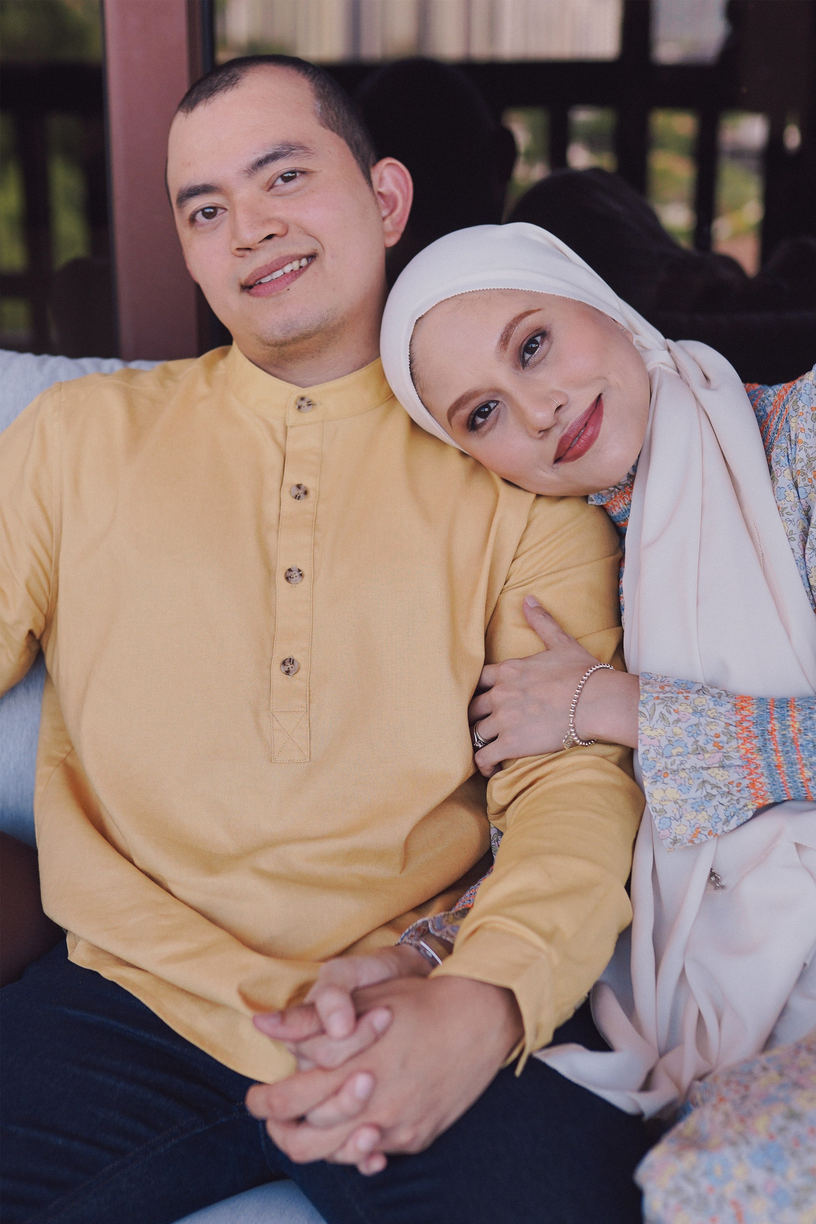 married couple in high quality Malaysian clothing by Petit Moi