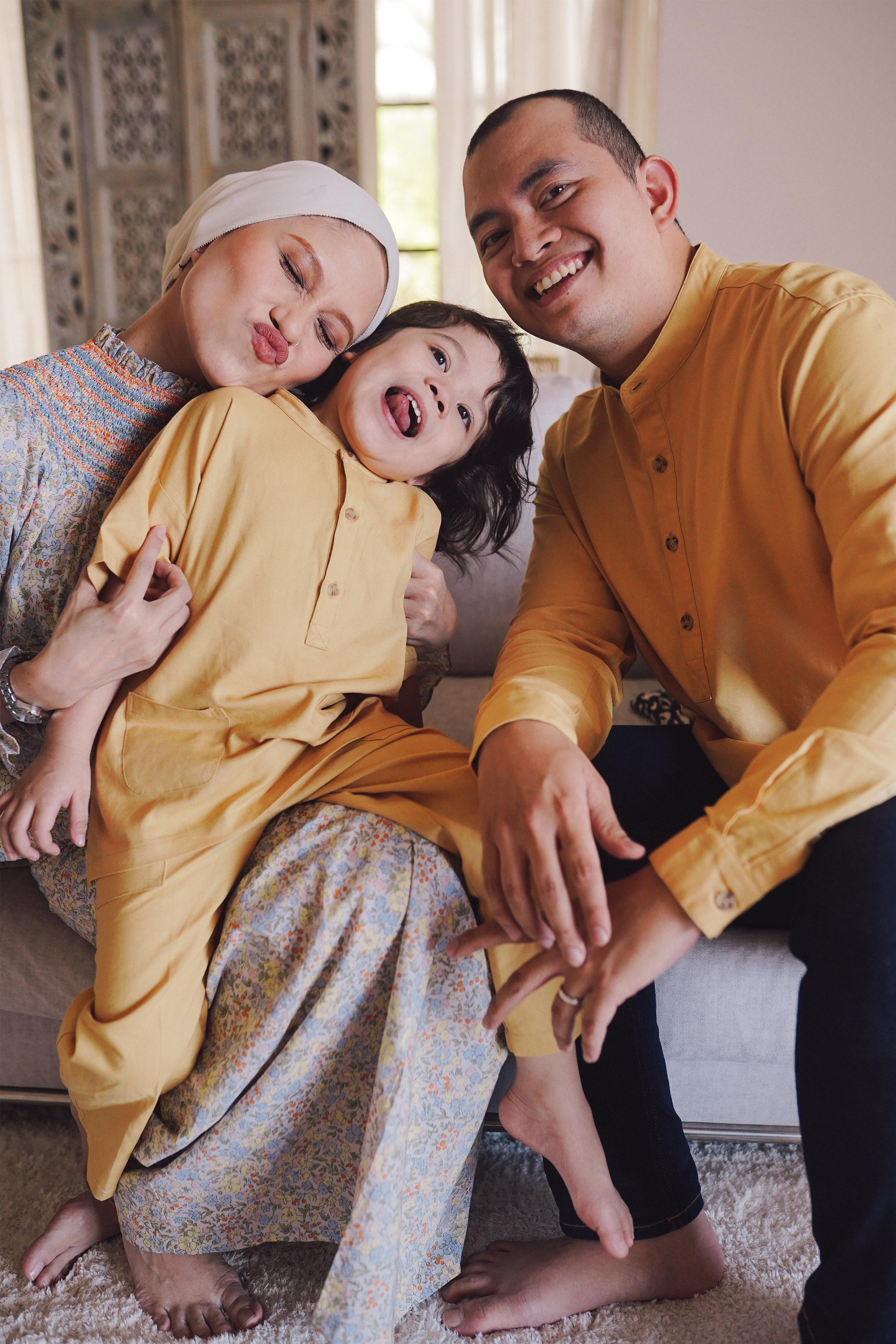 family in high quality modern malaysian clothing by Petit Moi