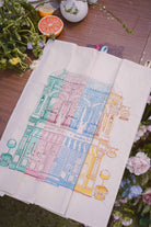 Petit moi bingka tea towels in all colours on table
