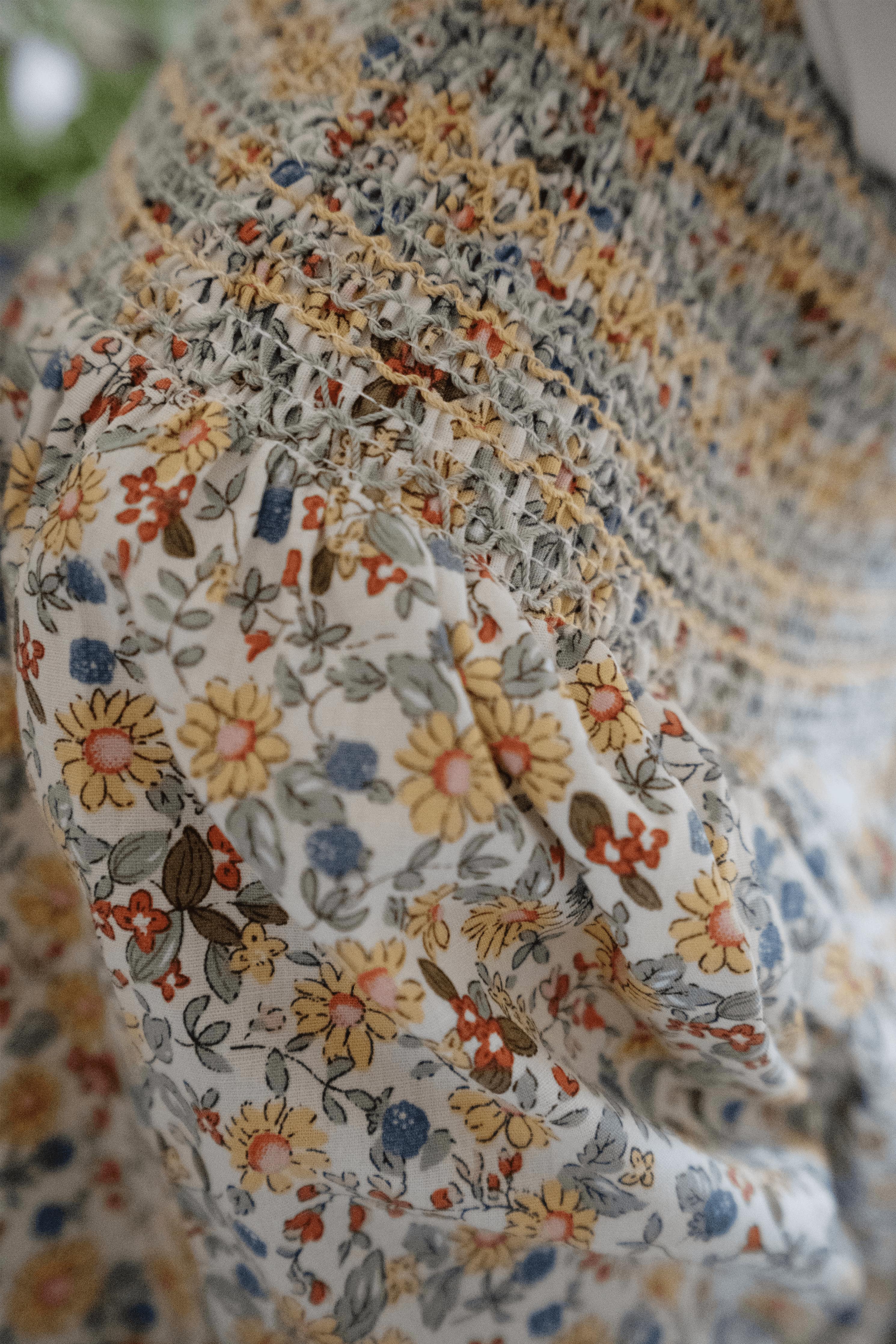 closeup shot of high quality floral baju kurung made by petit moi