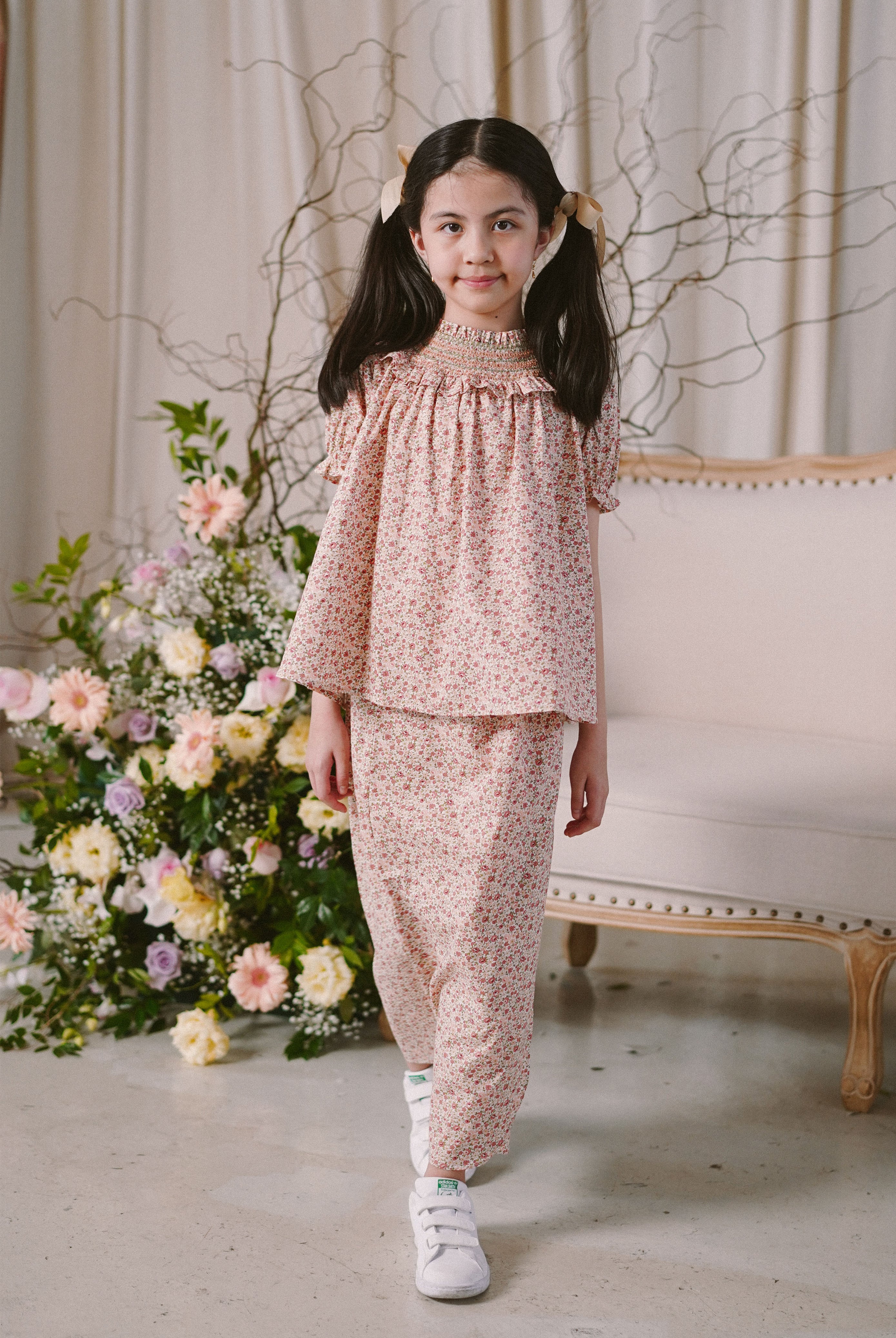 little girl modelling in high quality flowery baju kurung by Petit Moi