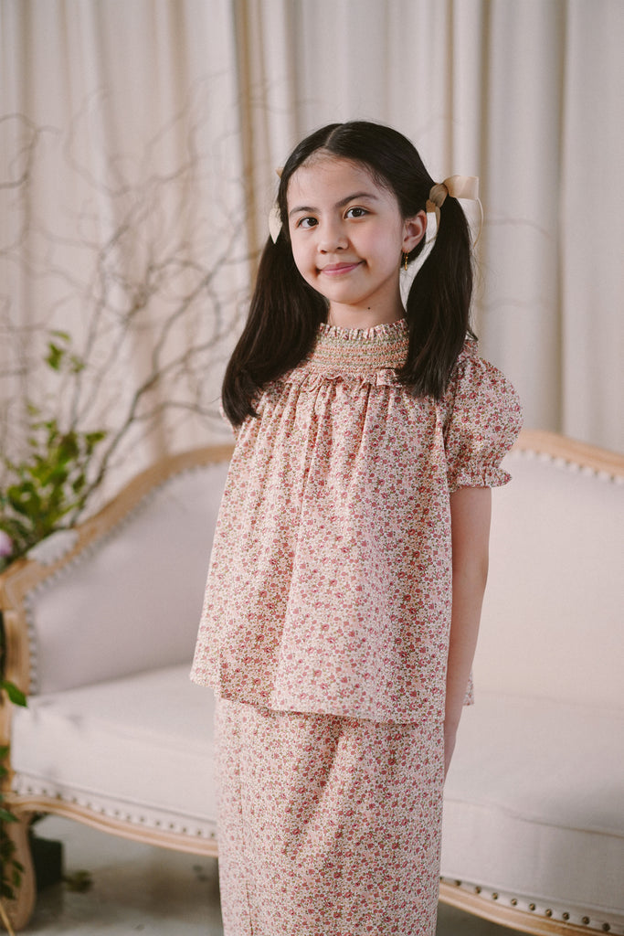little girl modelling in high quality baju kurung by Petit Moi