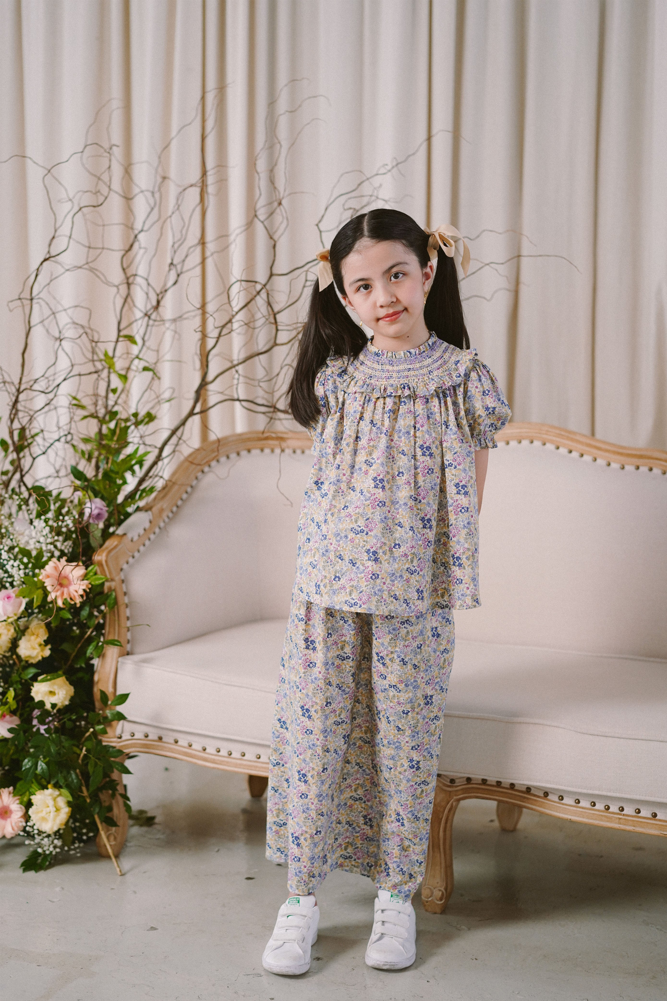 Little girl modelling in high quality baju kurung by Petit Moi