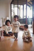 Brothers and sisters in high quality matching sweaters made by petit moi