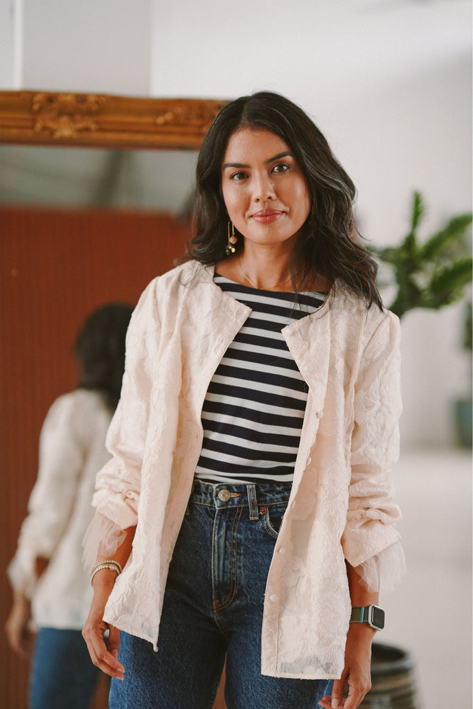 woman in high quality white baju kurung with casual look