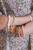 lady with crossed arms wearing bracelets from Petit Moi