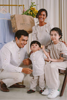 family with matching modern Malaysian clothing from Petit Moi