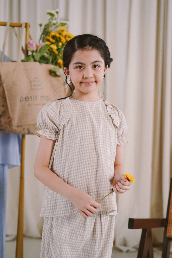 girl in white and grey baju kurung from Petit Moi