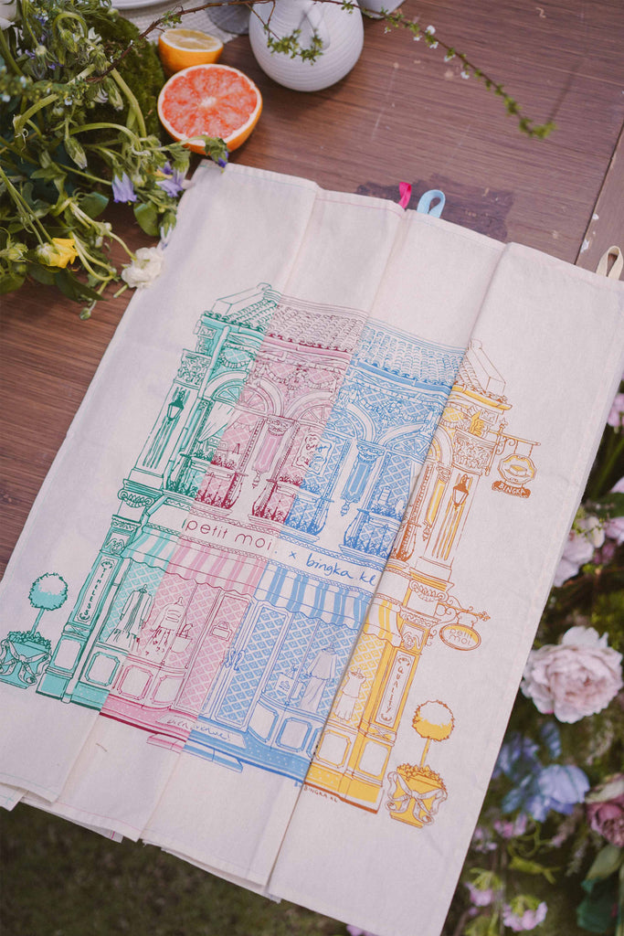 Petit moi bingka tea towels in all colours on table