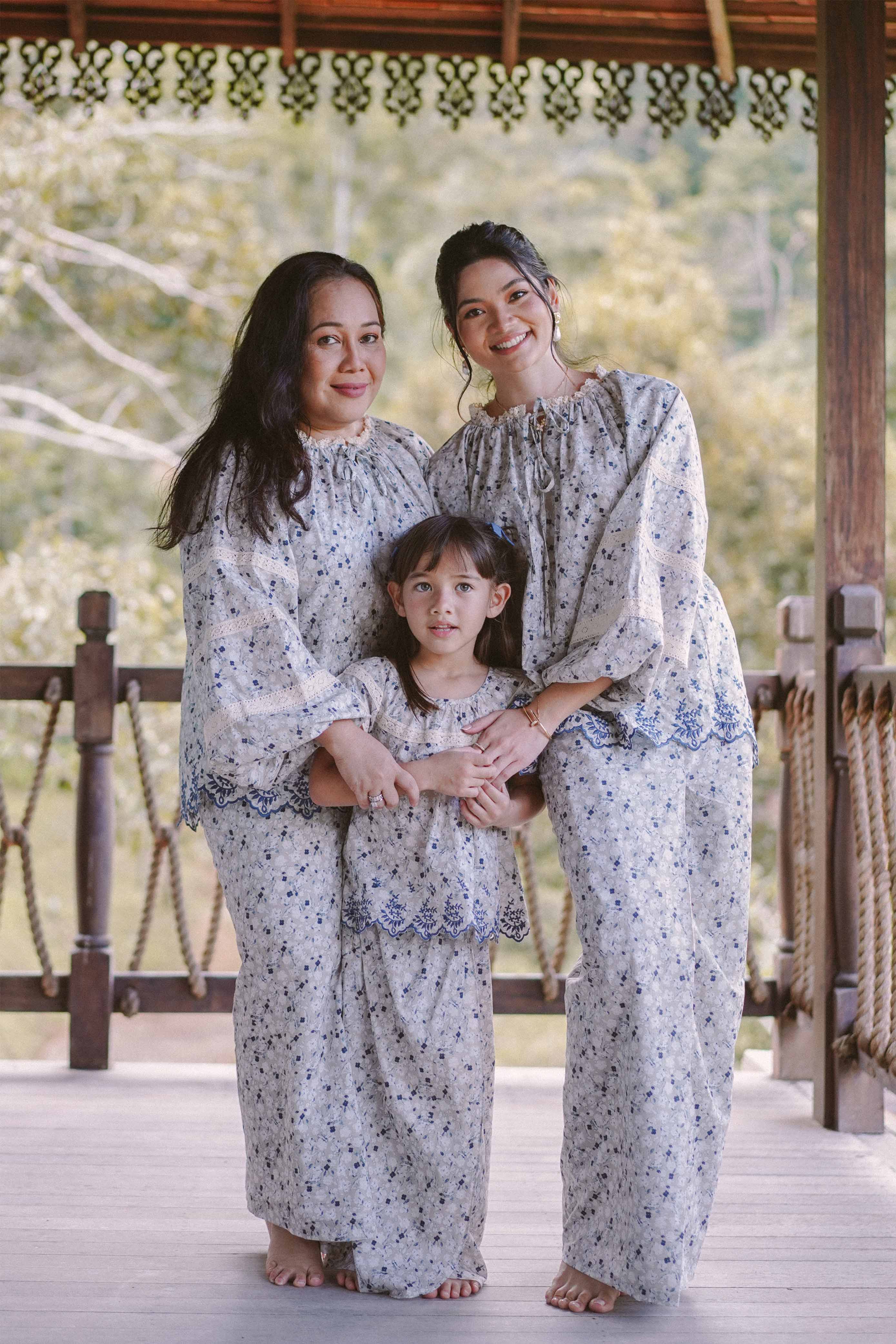 Mother, daughter and sister in matching high quality baju kurung by Petit Moi