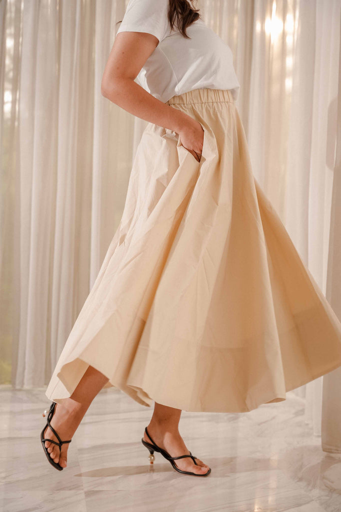 female model in high quality light brown skirt by petit moi