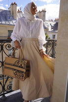 female model in high quality light brown skirt by petit moi
