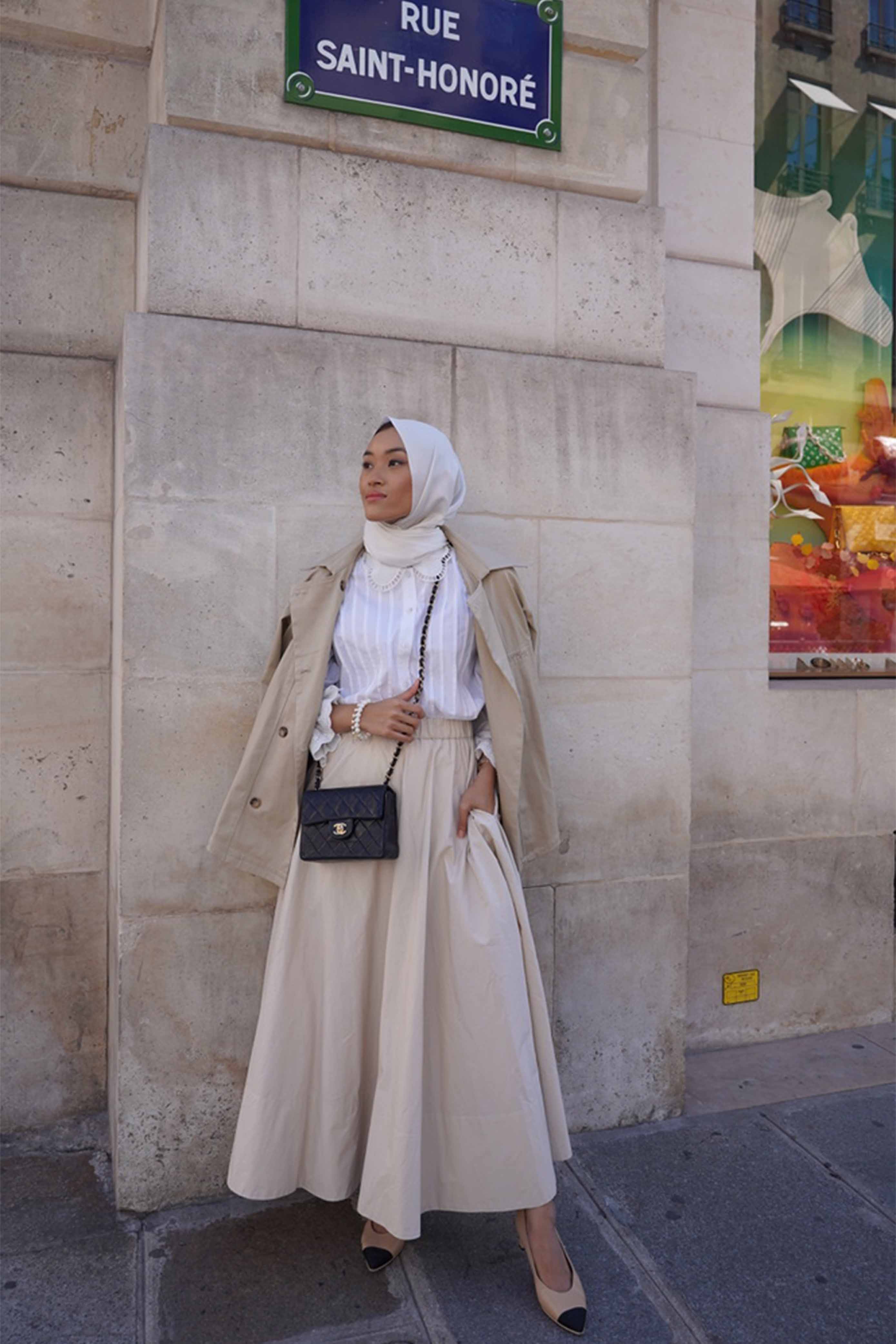 female model in paris wearing high quality clothes by petit moi.