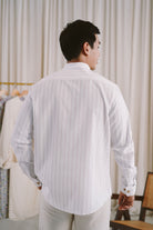 male model in white striped kurta by Petit Moi