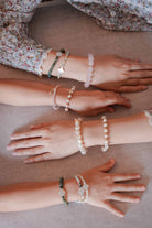 Mother and her kids showing off their new high quality bracelets made by petit moi