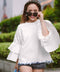 female model in white blouse by petit moi