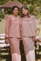 two best friends posing in baju kurung by petit moi