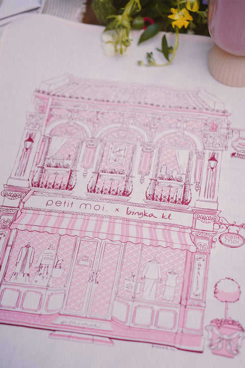 pink bingka tea towel laid out